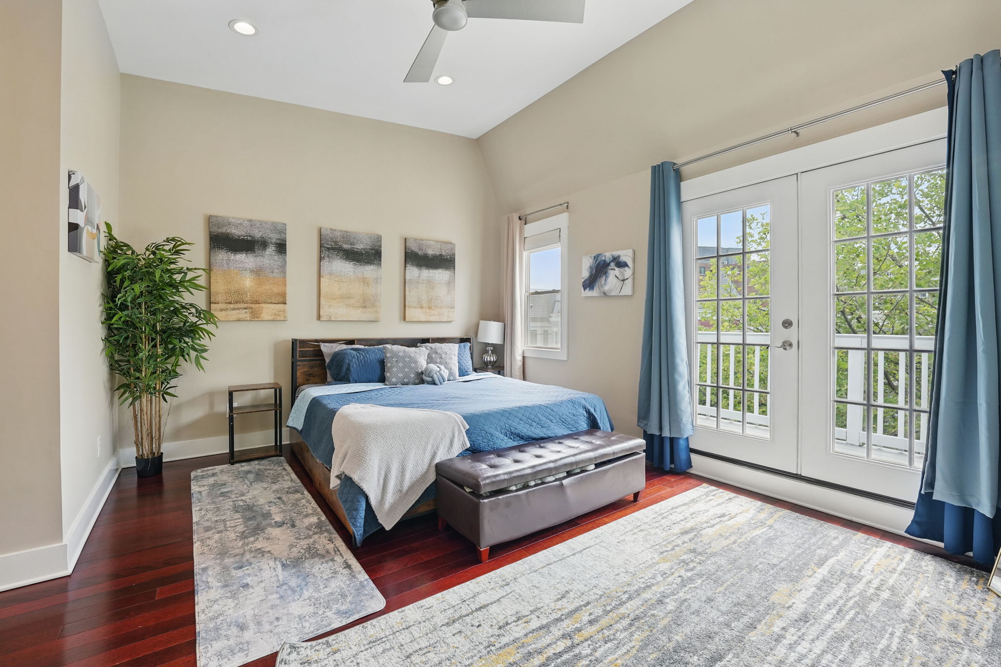 28 Q Street Northeast, Unit 2 Washington, DC 20002 - Photo 22 of 41 a spacious bedroom with a large bed and a large window