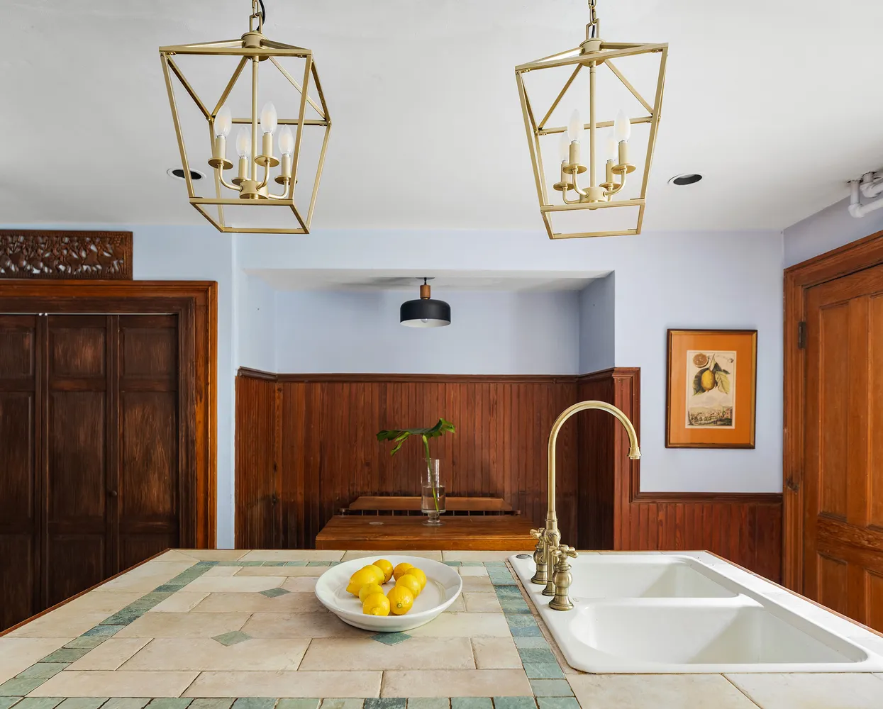a bathroom with a granite countertop sink mirror and shower