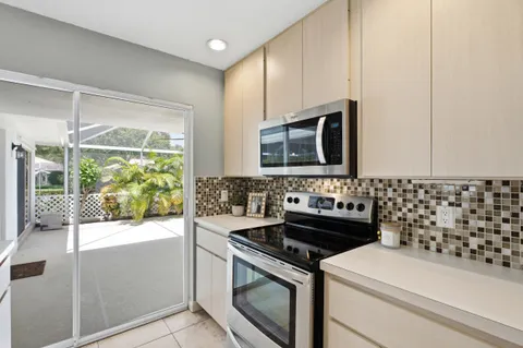 $355,000 | 10701 Chapman Oak Court, Palm Beach Gardens, FL 33410