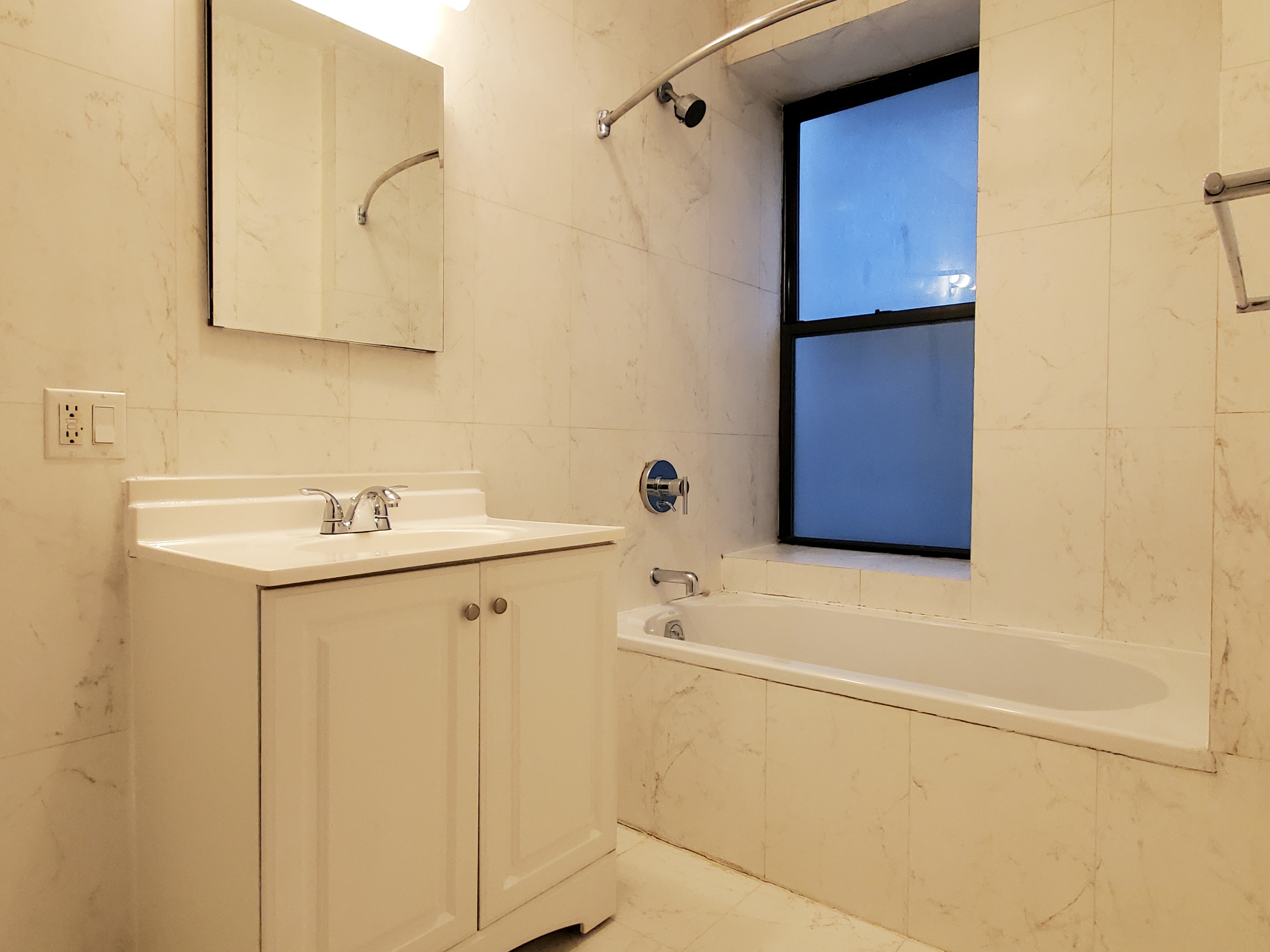 305 West 150th Street, Unit 307 Manhattan, NY 10039 - Photo 3 of 7 a bathroom with a sink and mirror