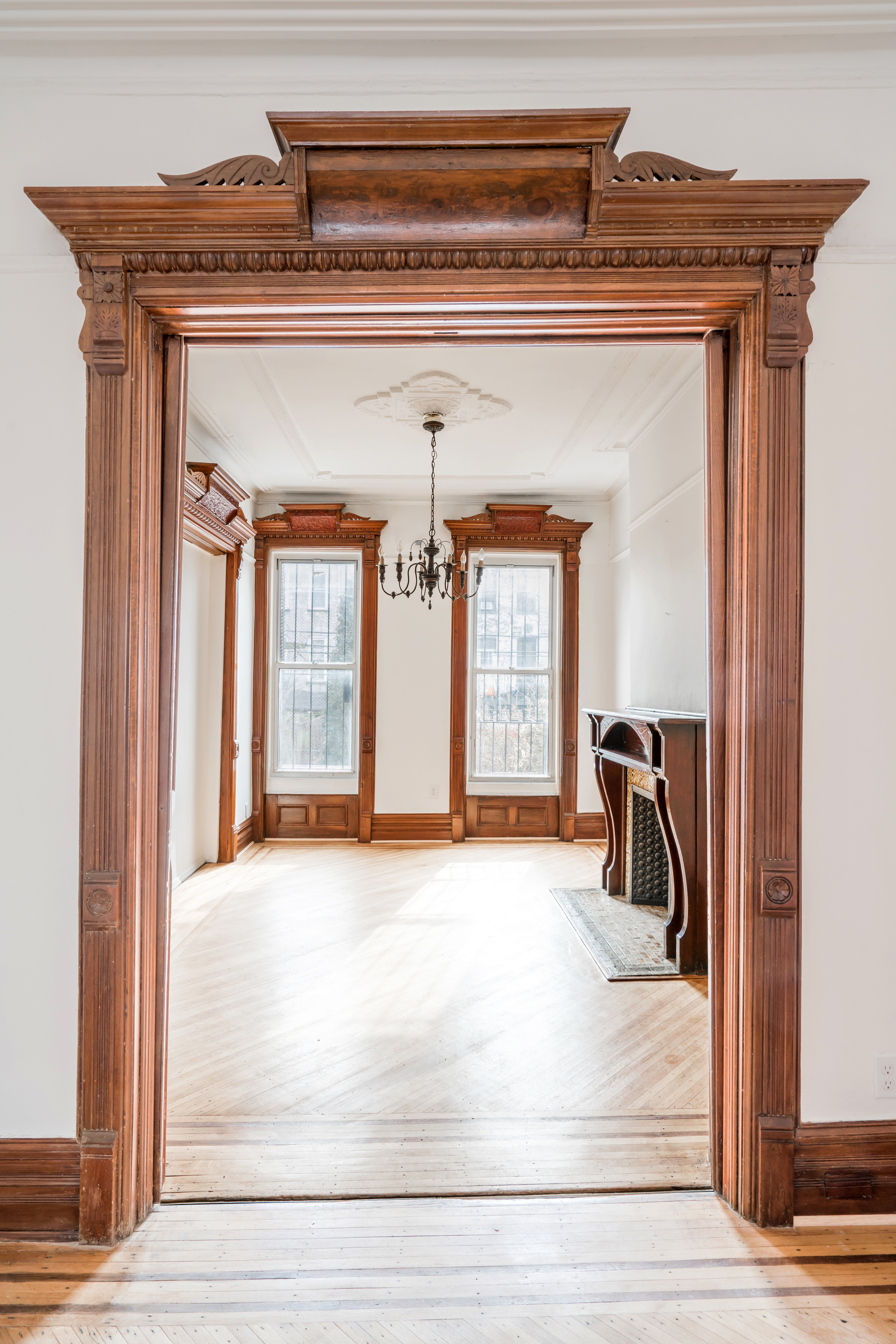 670 Macon Street, Unit 2 Brooklyn, NY 11233 - Photo 3 of 16 a view of a living room and front door