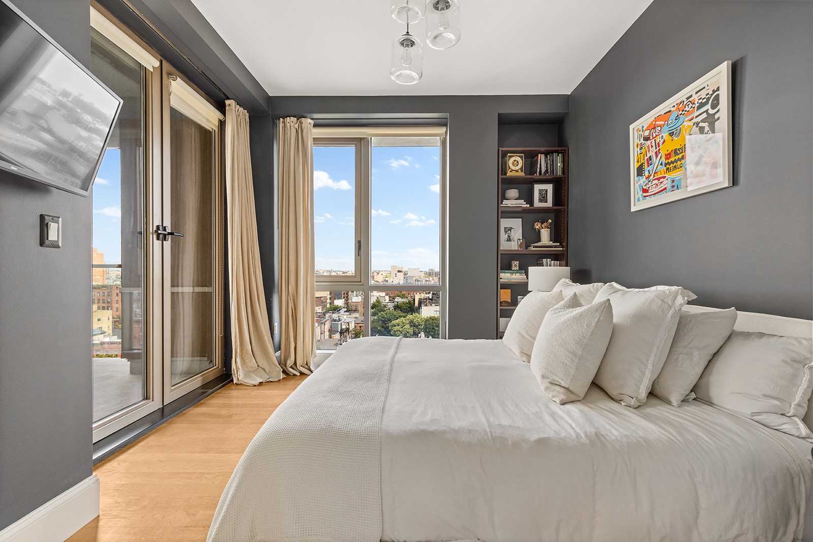 144 North 8th Street, Unit 8C Brooklyn, NY 11249 - Photo 4 of 13 a bedroom with a bed and a large window