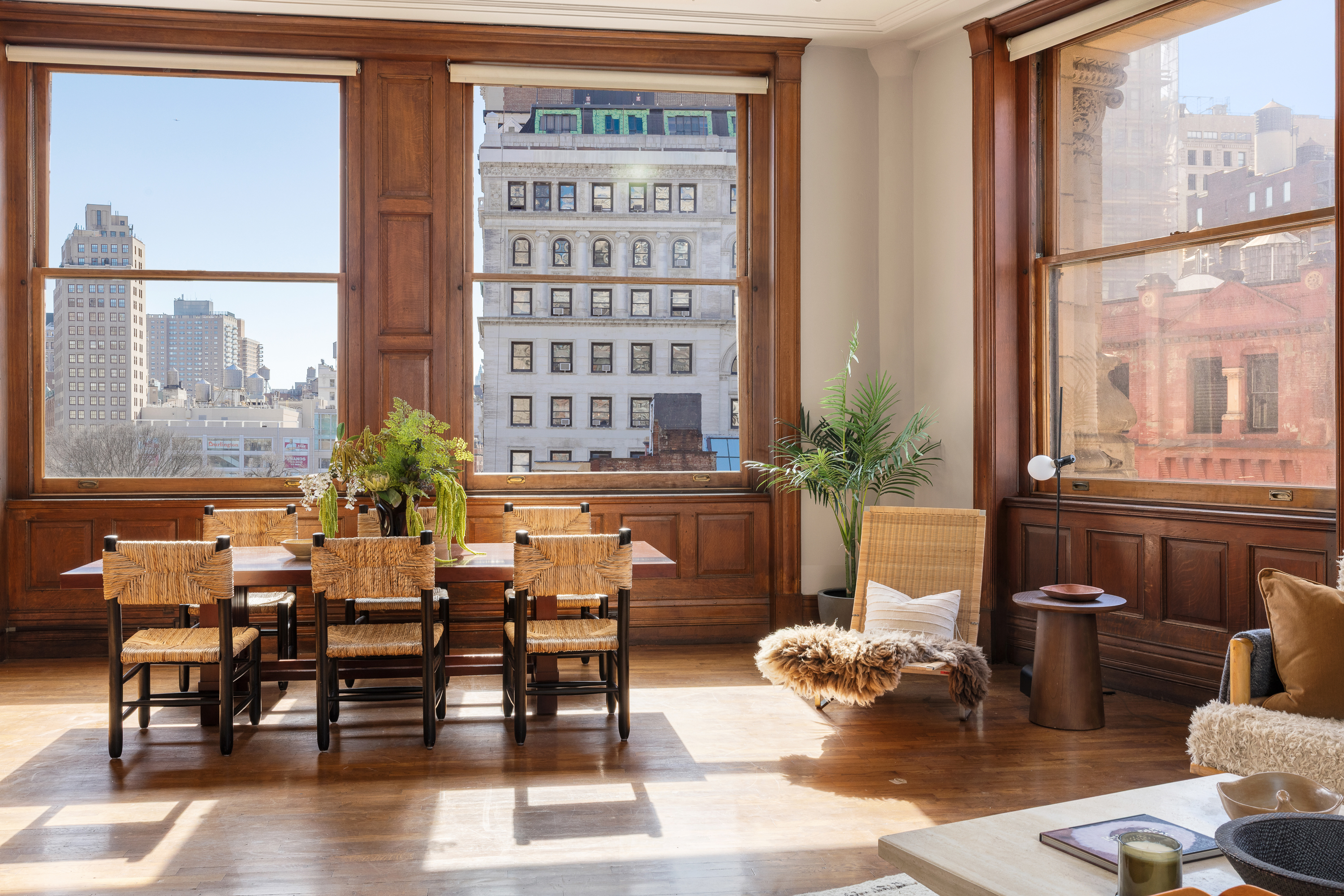874 Broadway, Unit 501 Manhattan, NY 10003 - Photo 1 of 17 a dining room with furniture and wooden floor