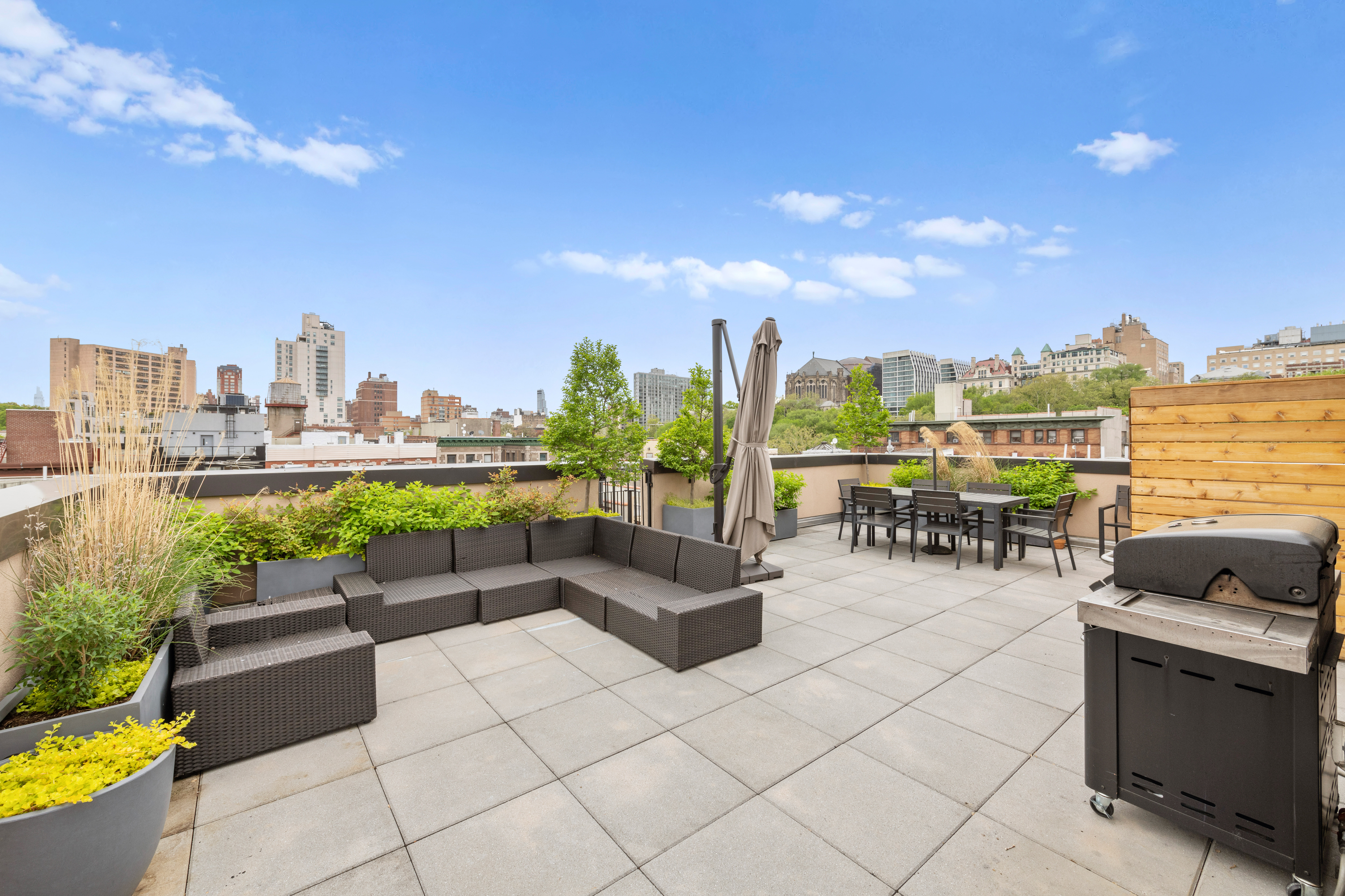 320 West 115th Street, Unit 4 Manhattan, NY 10026 - Photo 9 of 12 a view of a terrace with furniture and city view