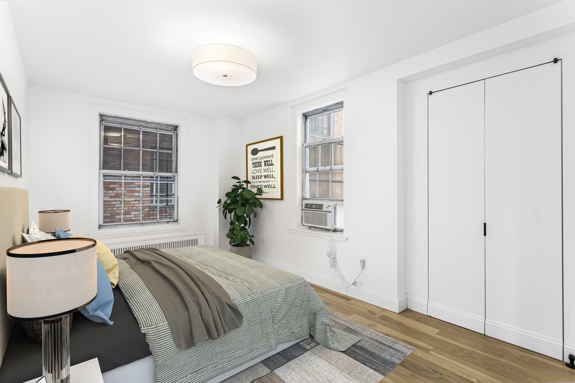 16 Park Avenue, Unit 6CD Manhattan, NY 10016 - Photo 7 of 12 a spacious bedroom with a bed and window