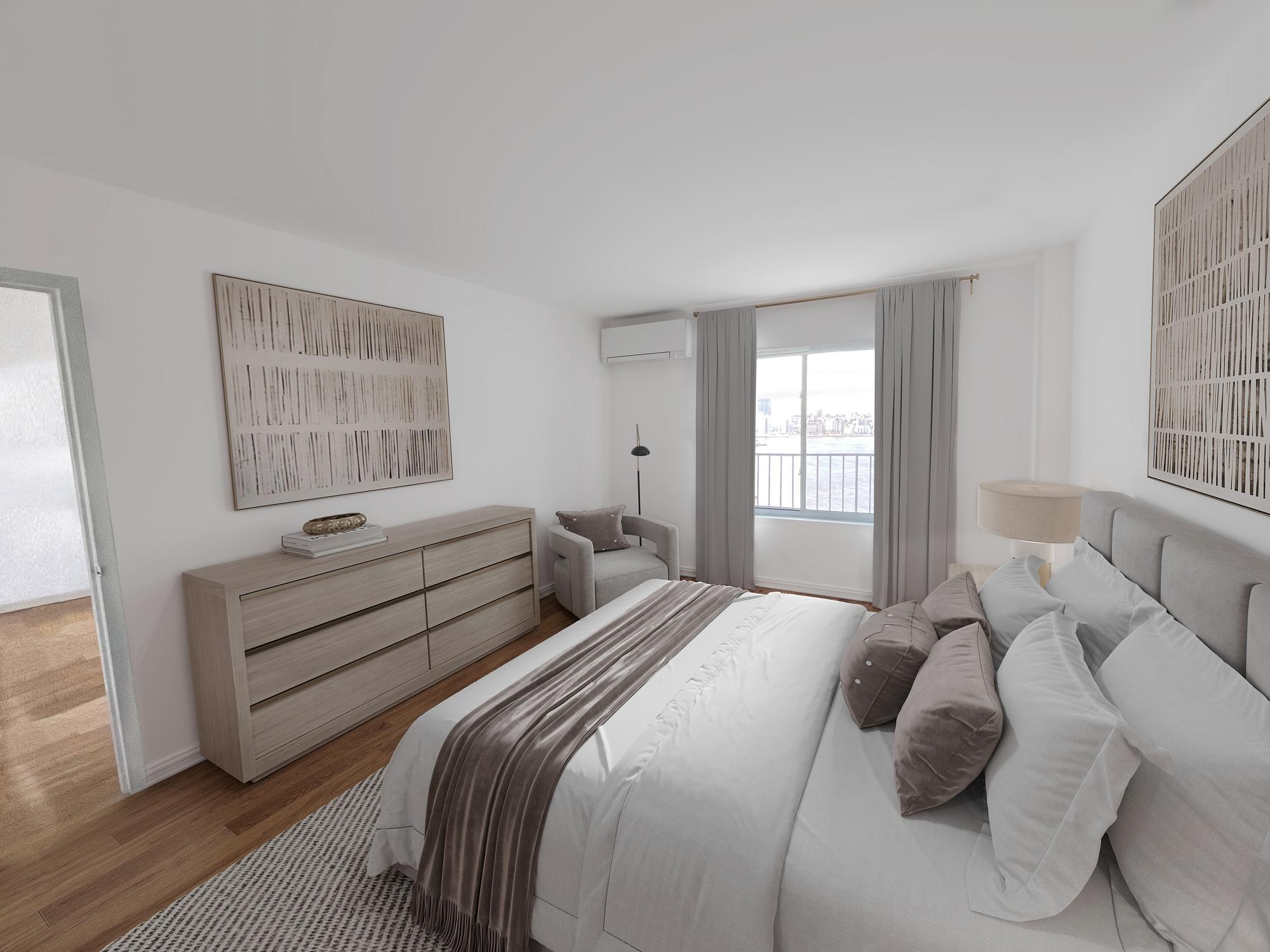 25-40 Shore Boulevard, Unit 15T Queens, NY 11102 - Photo 6 of 22 a bedroom with a bed and window