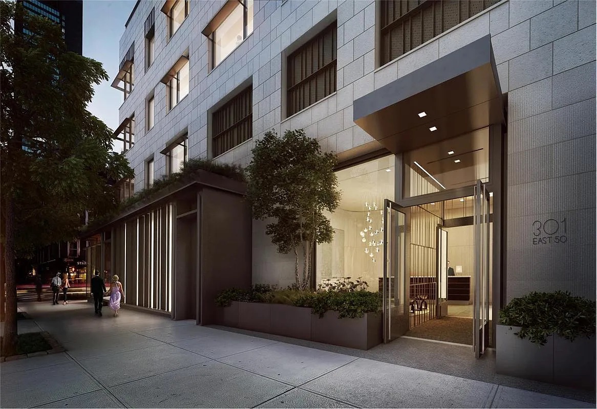 301 East 50th Street, Unit 4B Manhattan, NY 10022 - Photo 9 of 13 a view of a building along with the street