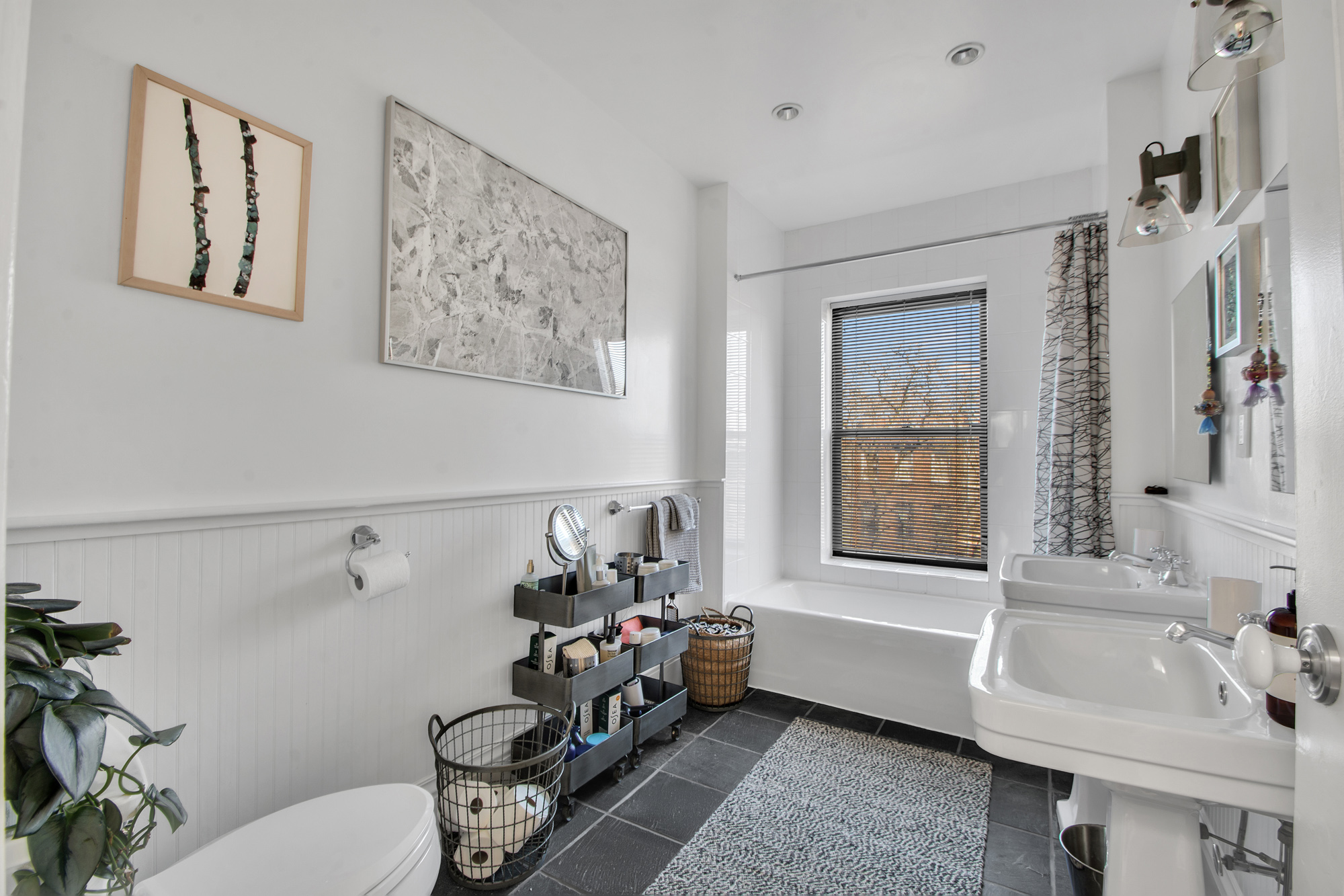 383 Grand Avenue Brooklyn, NY 11238 - Photo 24 of 32 a bathroom with a bathtub sink and toilet