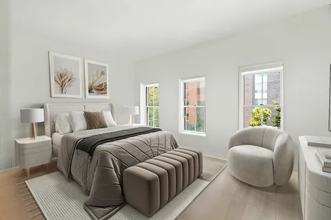 a bedroom with furniture and a couch