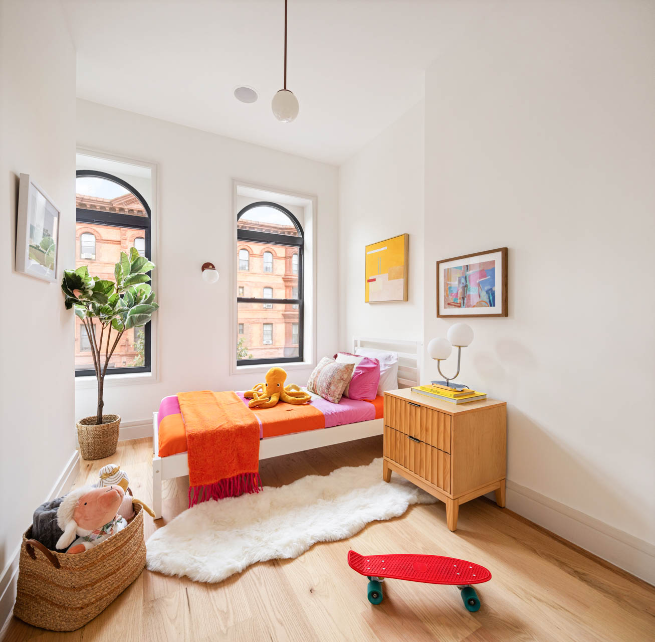 768 Halsey Street Brooklyn, NY 11233 - Photo 8 of 14 a bedroom with a bed and a couch