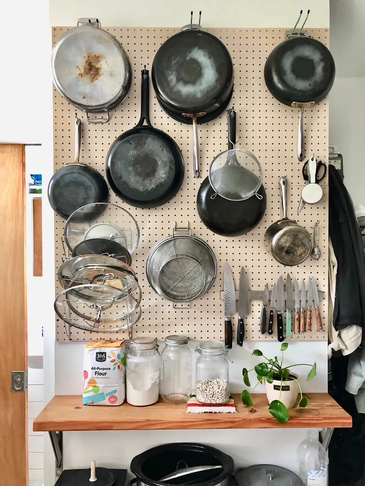 a kitchen with a stove and cabinets