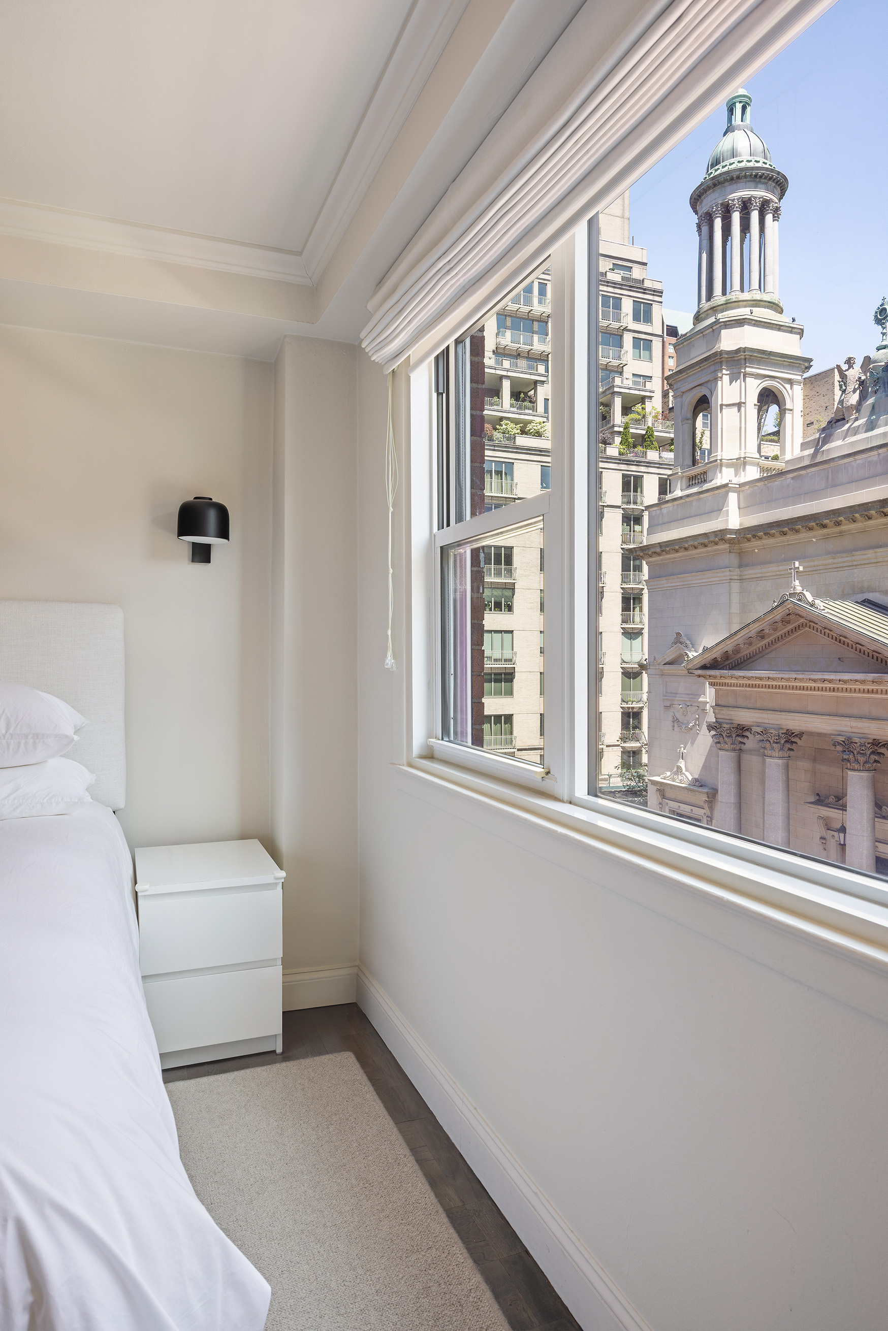 123 East 75th Street, Unit 6B Manhattan, NY 10021 - Photo 8 of 13 a living room with furniture a window and a ceiling fan