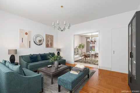 a living room with furniture and a table