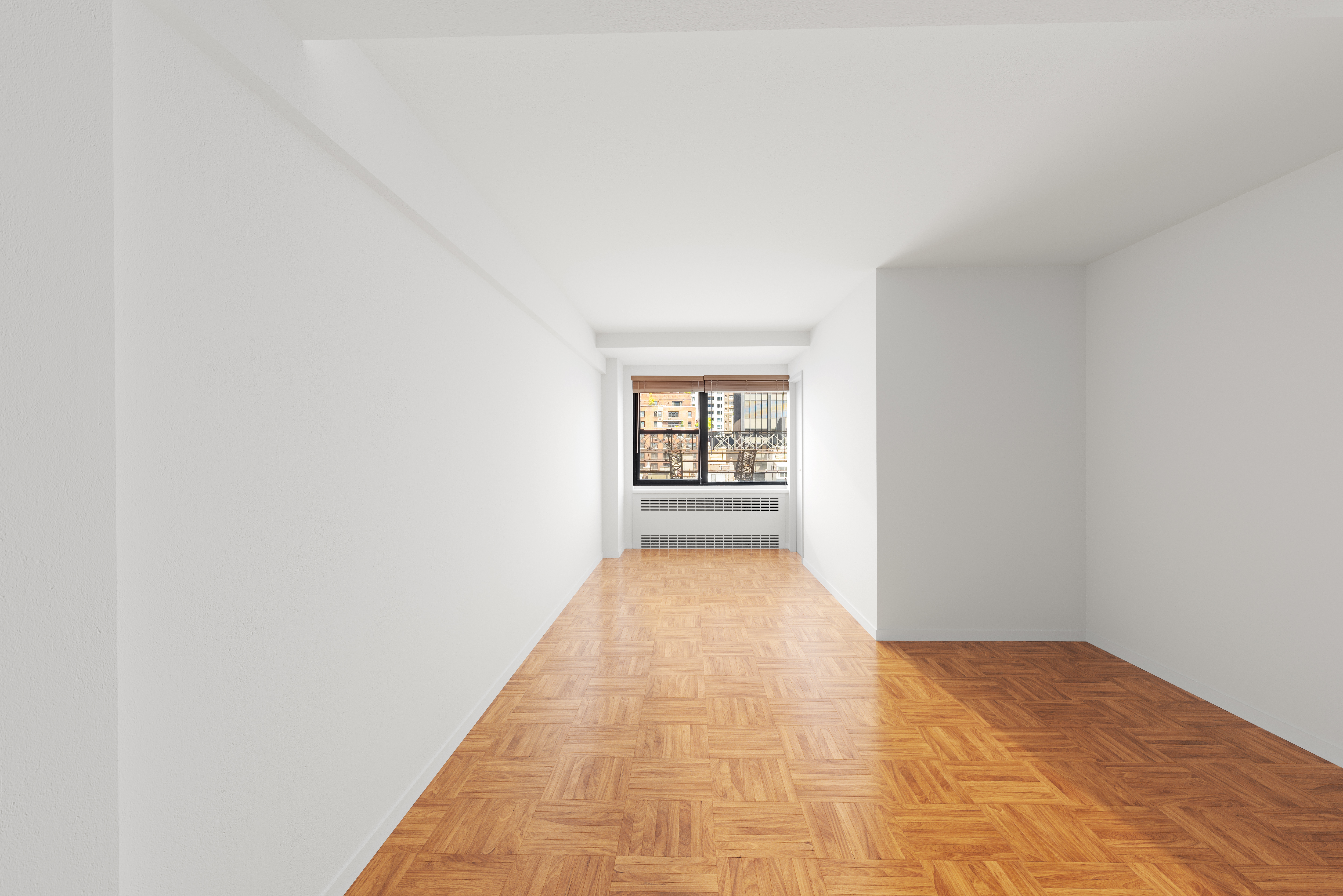 347 East 53rd Street, Unit 9C Manhattan, NY 10022 - Photo 2 of 10 a view of an empty room and window