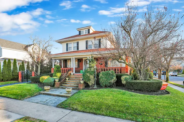 a view of a cafe with a outdoor seating