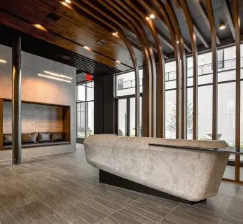 a view of an empty room with a fireplace and a window
