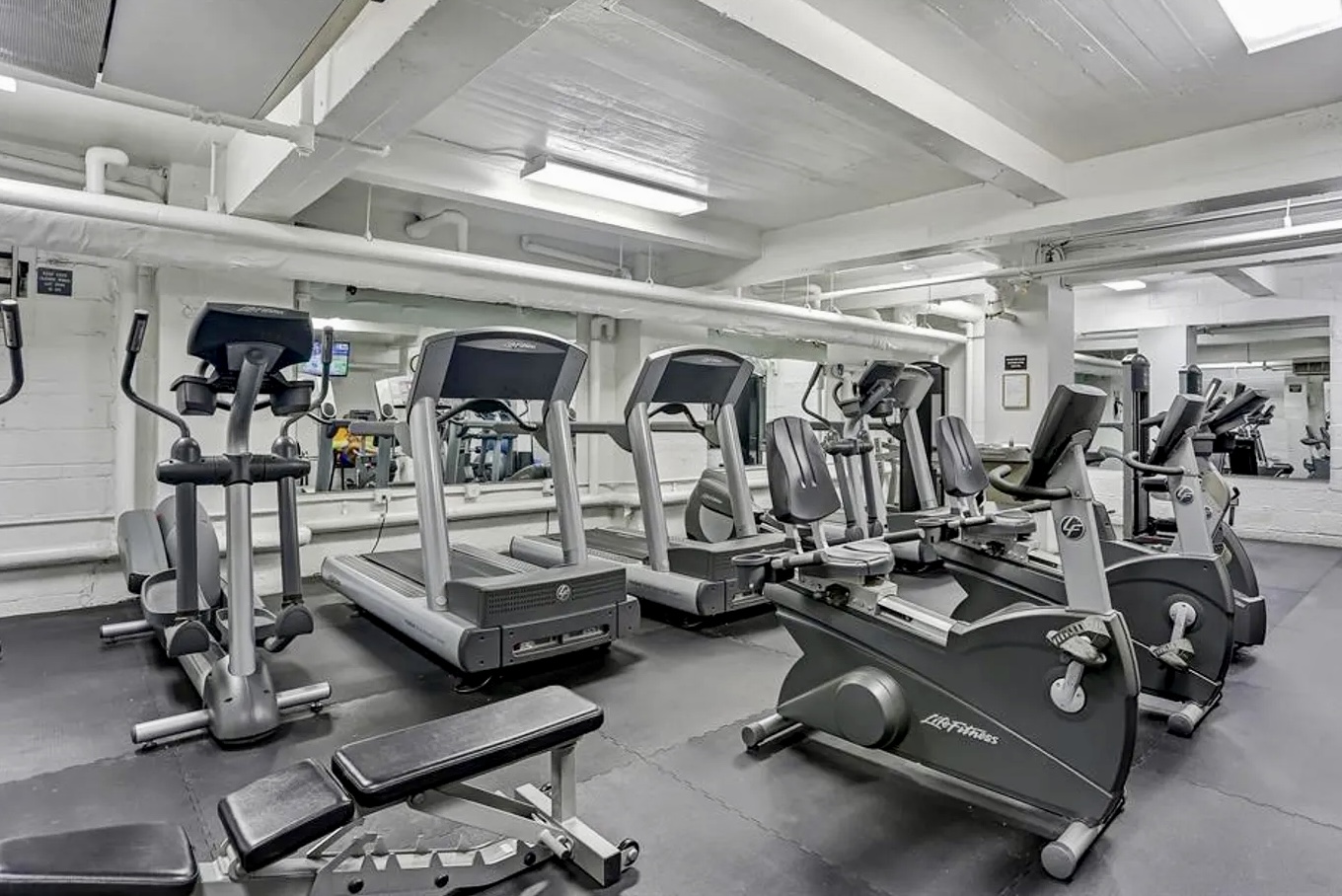 425 East 63rd Street, Unit E7A Manhattan, NY 10065 - Photo 10 of 13 a view of a room with gym equipment