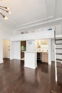 a view of a hallway with an empty room