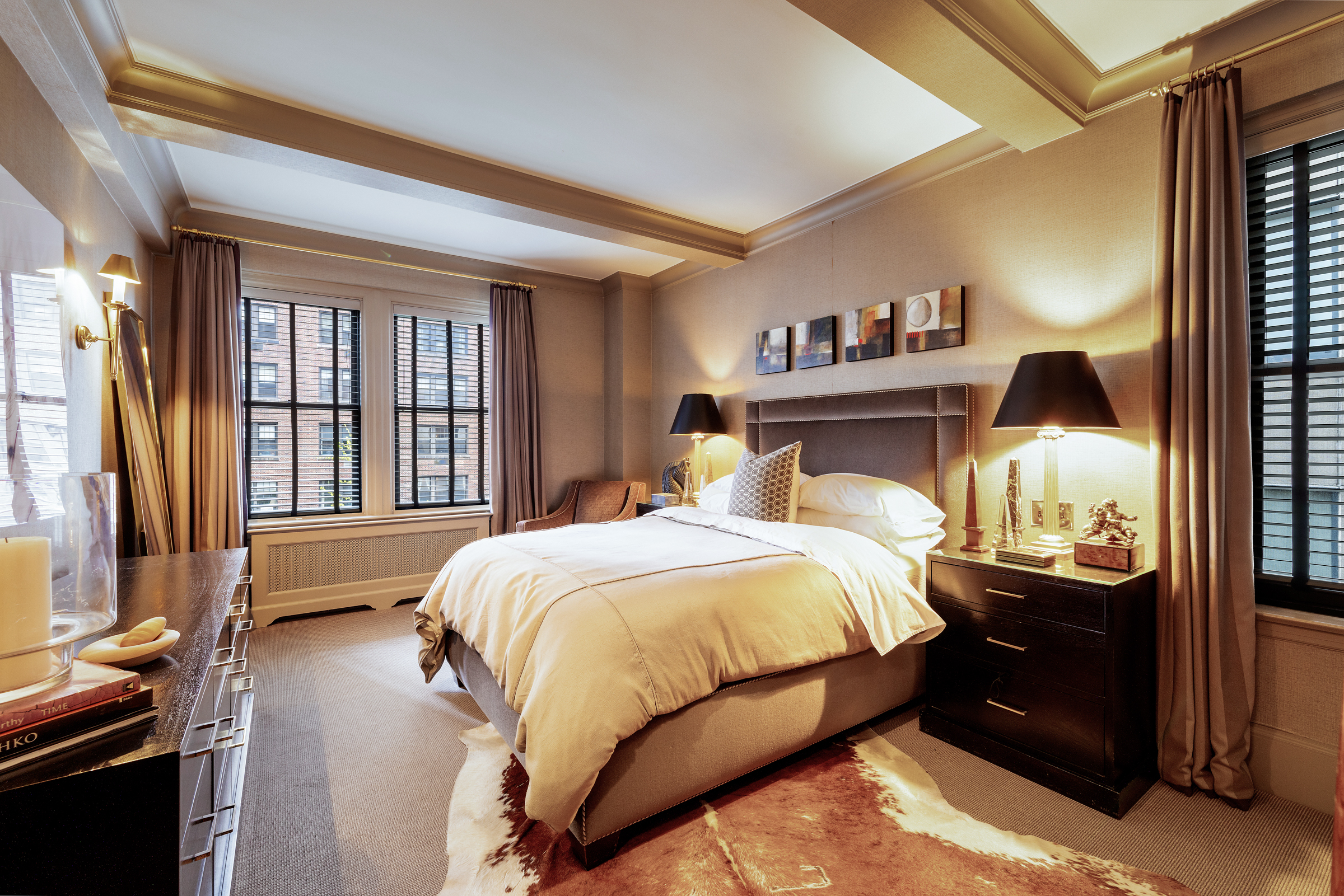 419 East 57th Street, Unit 6A Manhattan, NY 10022 - Photo 8 of 13 a bedroom with a bed and a large window