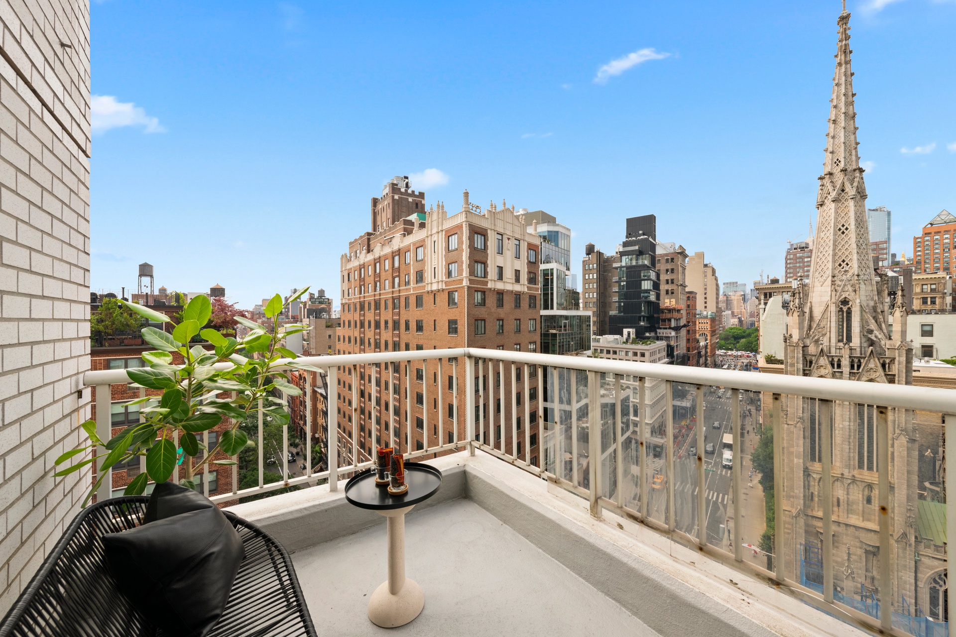 70 East 10th Street, Unit 15R Manhattan, NY 10003 - Photo 3 of 12 a view of a balcony with wooden floor