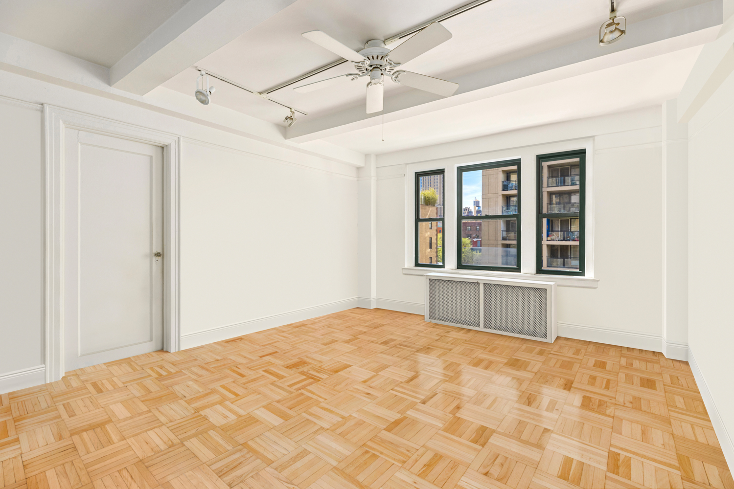 65 West 95th Street, Unit 8C Manhattan, NY 10025 - Photo 9 of 15 a bedroom with a large bed window and balcony