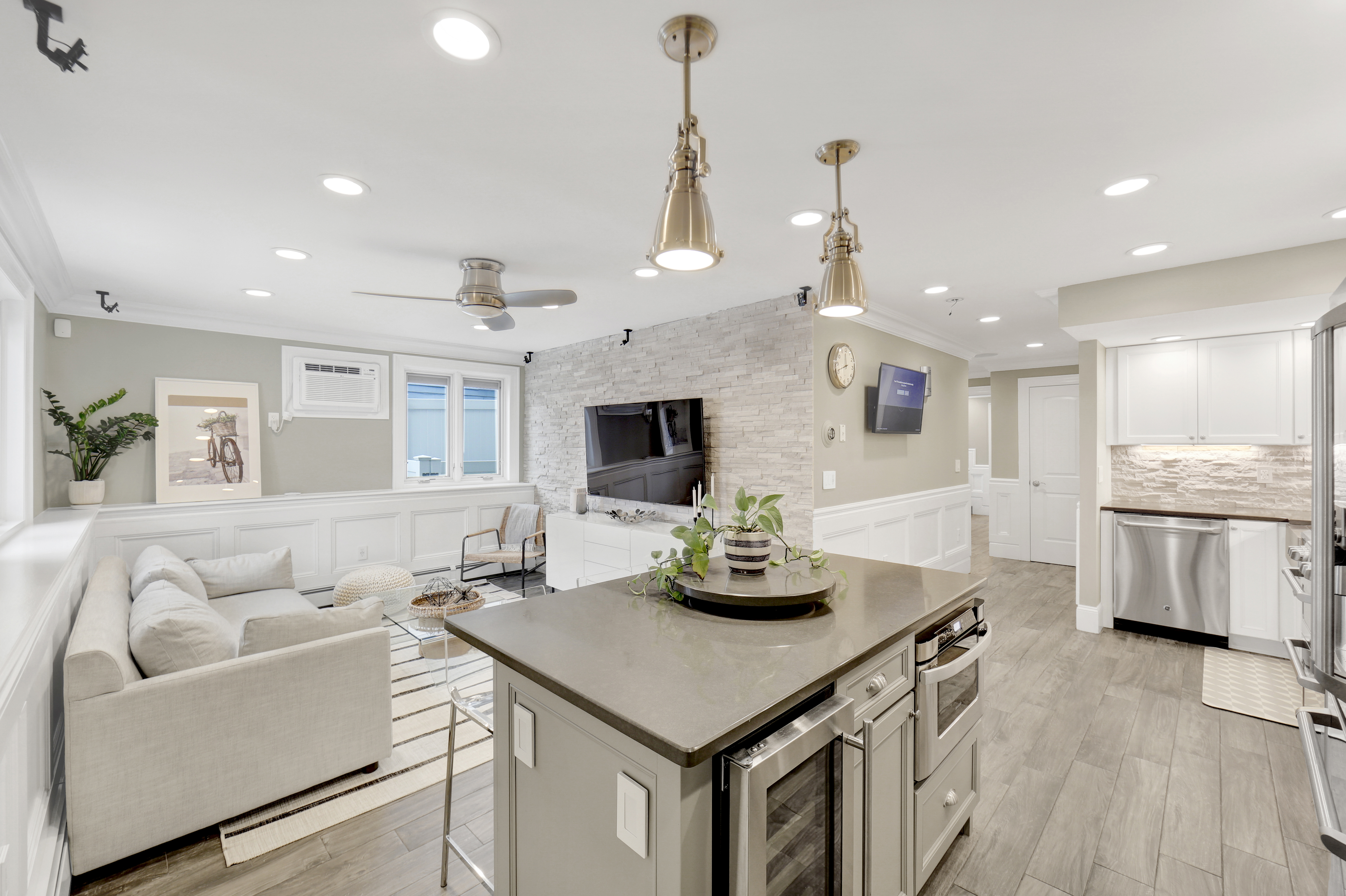 1-69 Beach 98th Street, Unit 1 Queens, NY 11694 - Photo 4 of 23 a living room with furniture and a wooden floor
