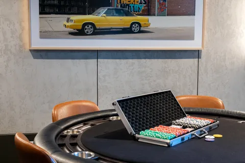 a table and chairs in front of a building