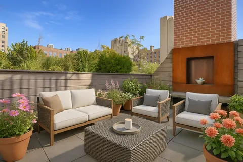 a view of a patio with couches and potted plants