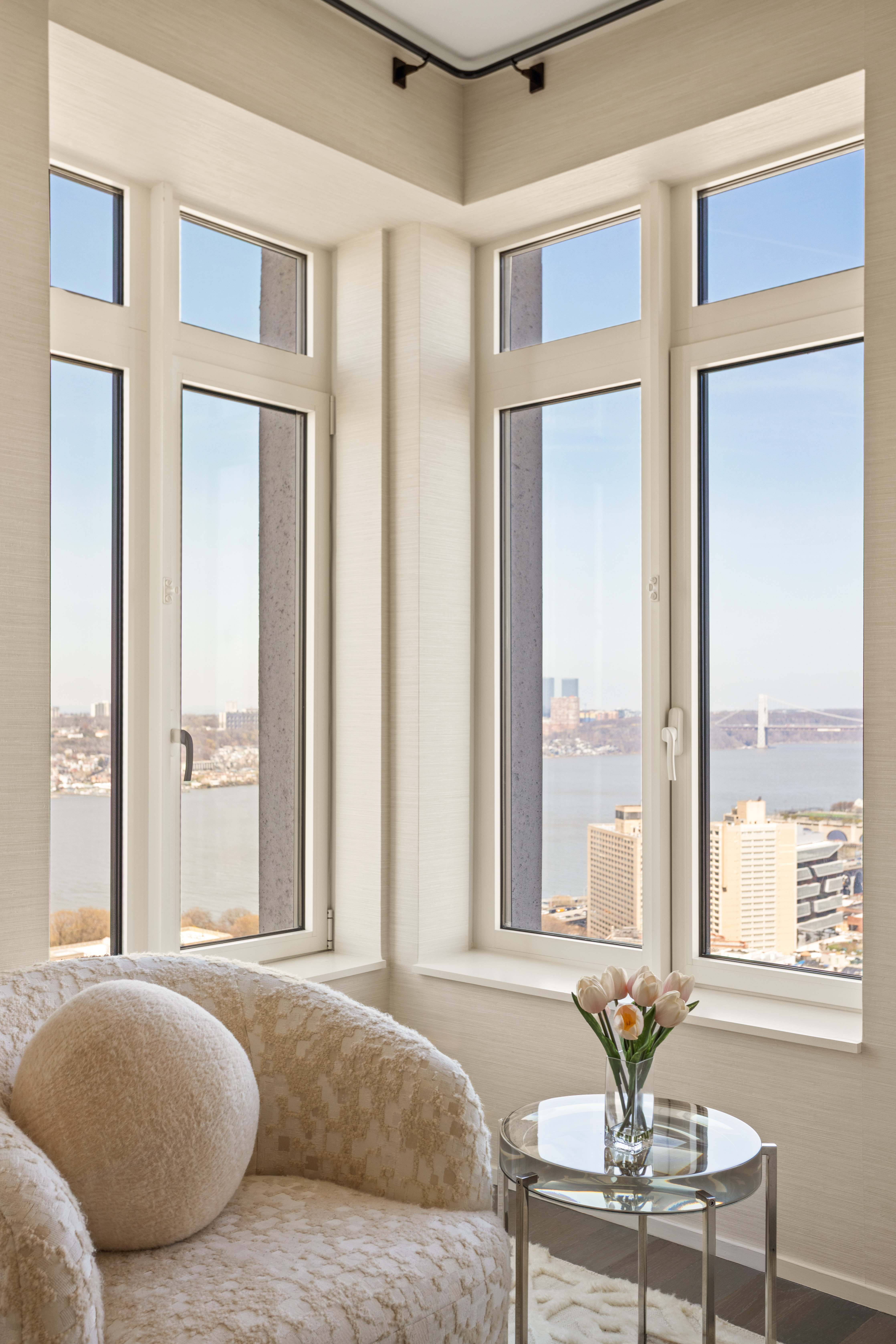 543 West 122nd Street, Unit PH31A Manhattan, NY 10027 - Photo 10 of 40 a bedroom with bed and glass windows