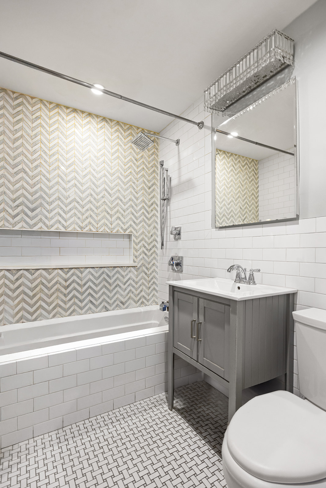 621 Putnam Avenue Brooklyn, NY 11221 - Photo 12 of 19 a bathroom with a sink a toilet and shower