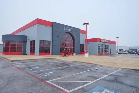 a view of parking garage with gym equipment
