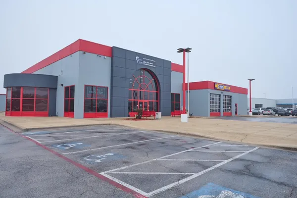 a view of parking garage with gym equipment