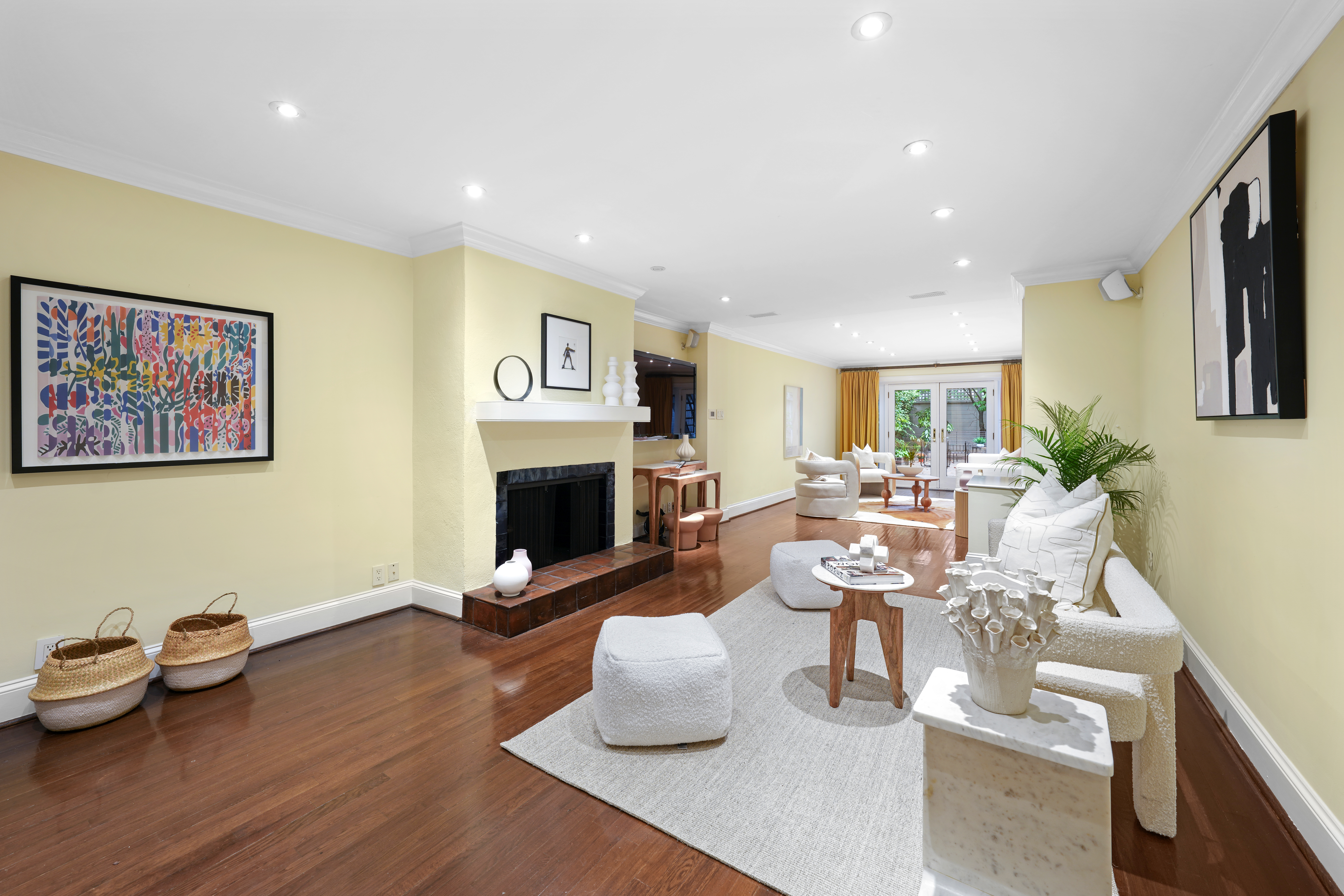 247 East 71st Street Manhattan, NY 10021 - Photo 7 of 31 a living room with furniture and a fireplace