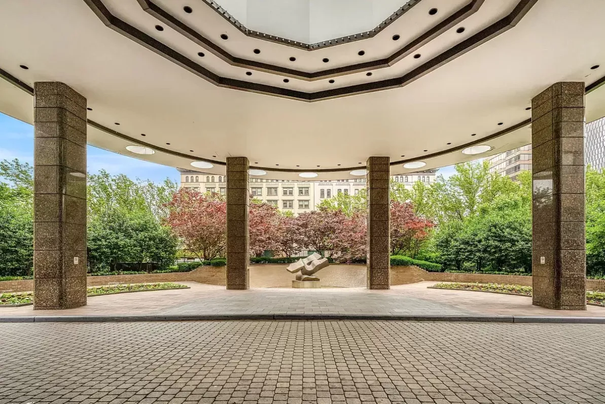 a view of an empty room with a large window
