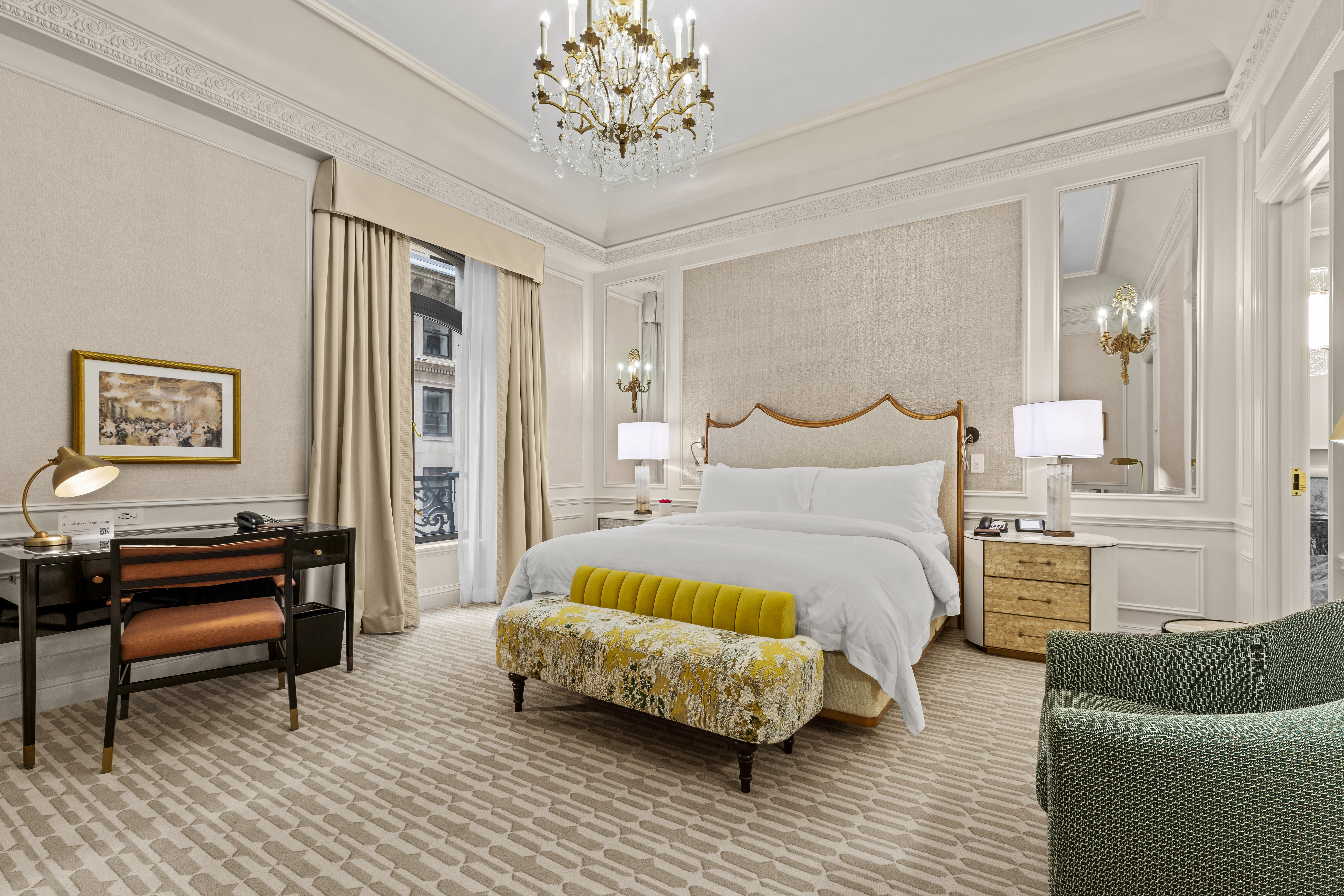 2 East 55th Street, Unit 918W17 Manhattan, NY 10022 - Photo 3 of 14 a spacious bedroom with a bed couch table and a chandelier