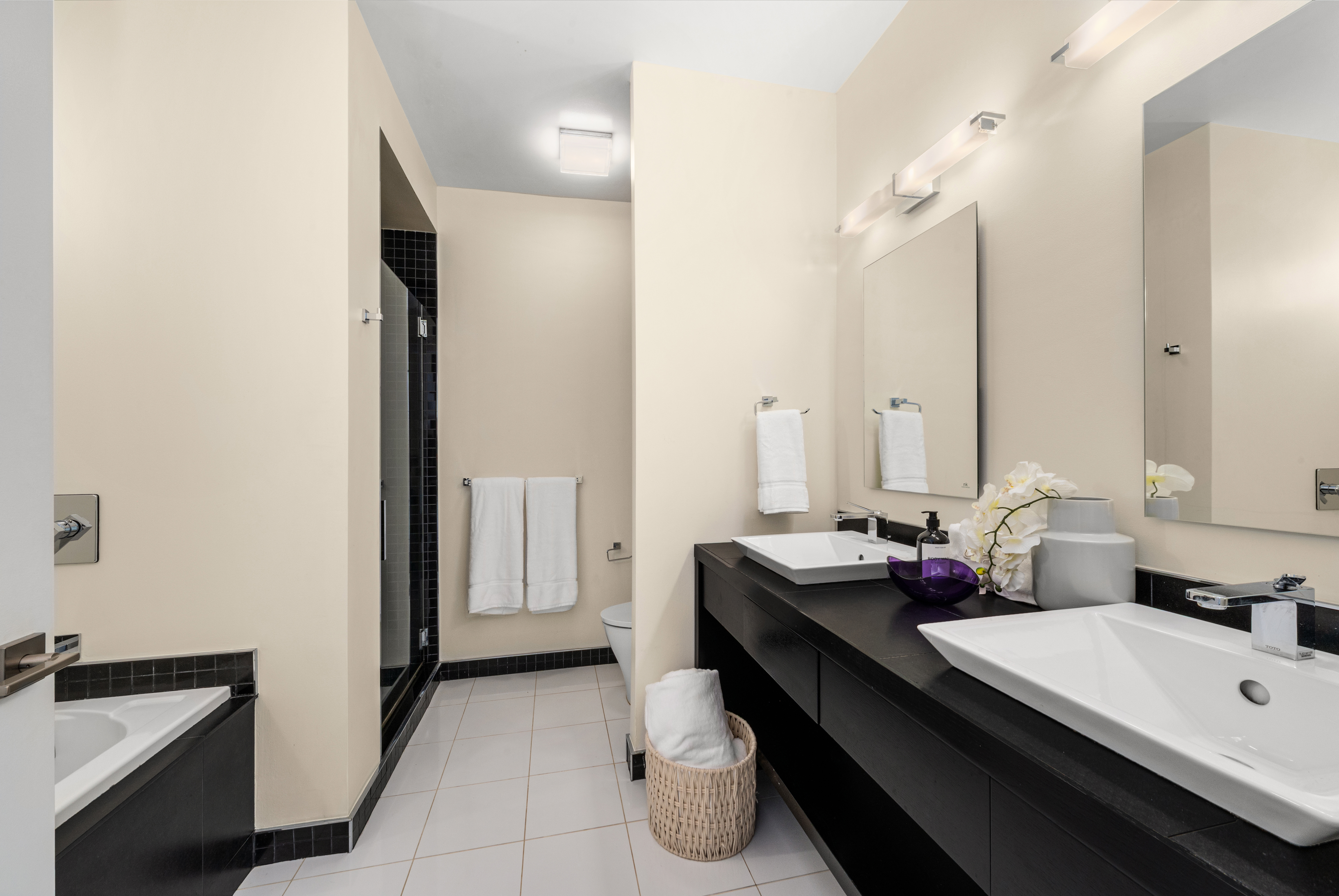 150 Columbus Avenue, Unit 22A Manhattan, NY 10023 - Photo 8 of 23 a bathroom with a sink and a mirror