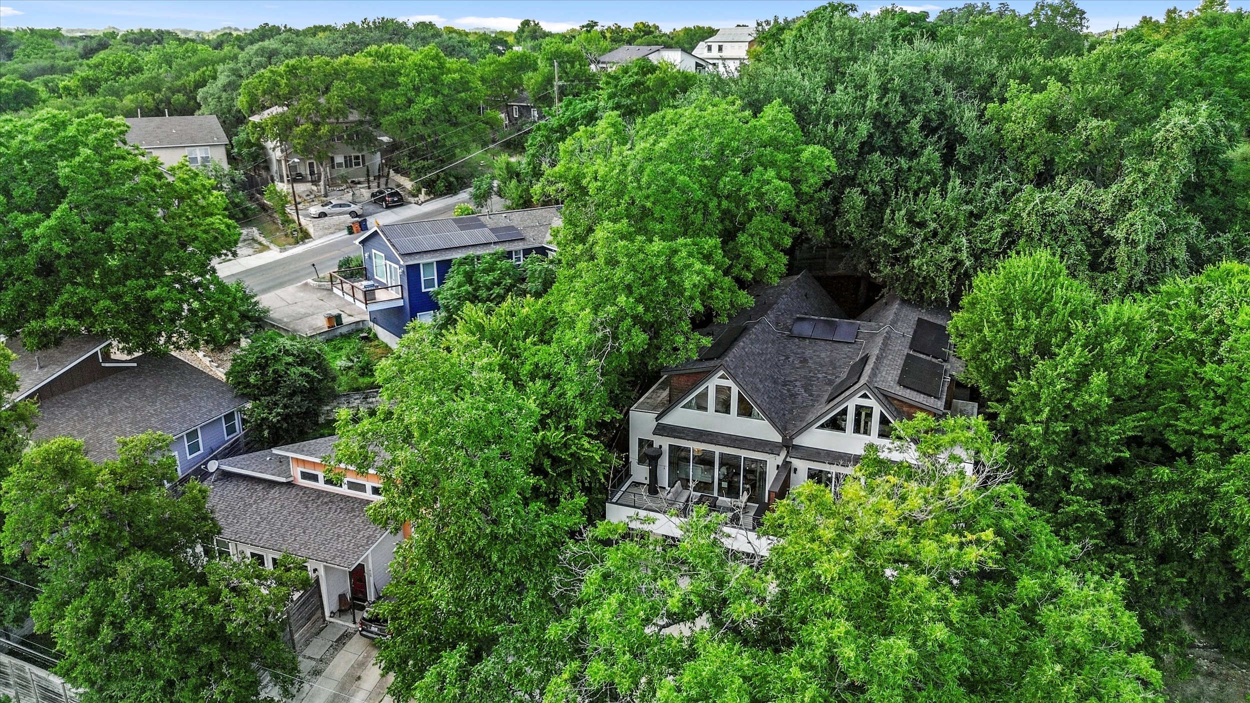2712 Oak Springs Drive, Unit A Austin, TX 78702 - Photo 34 of 38 an aerial view of a house with a yard and trees