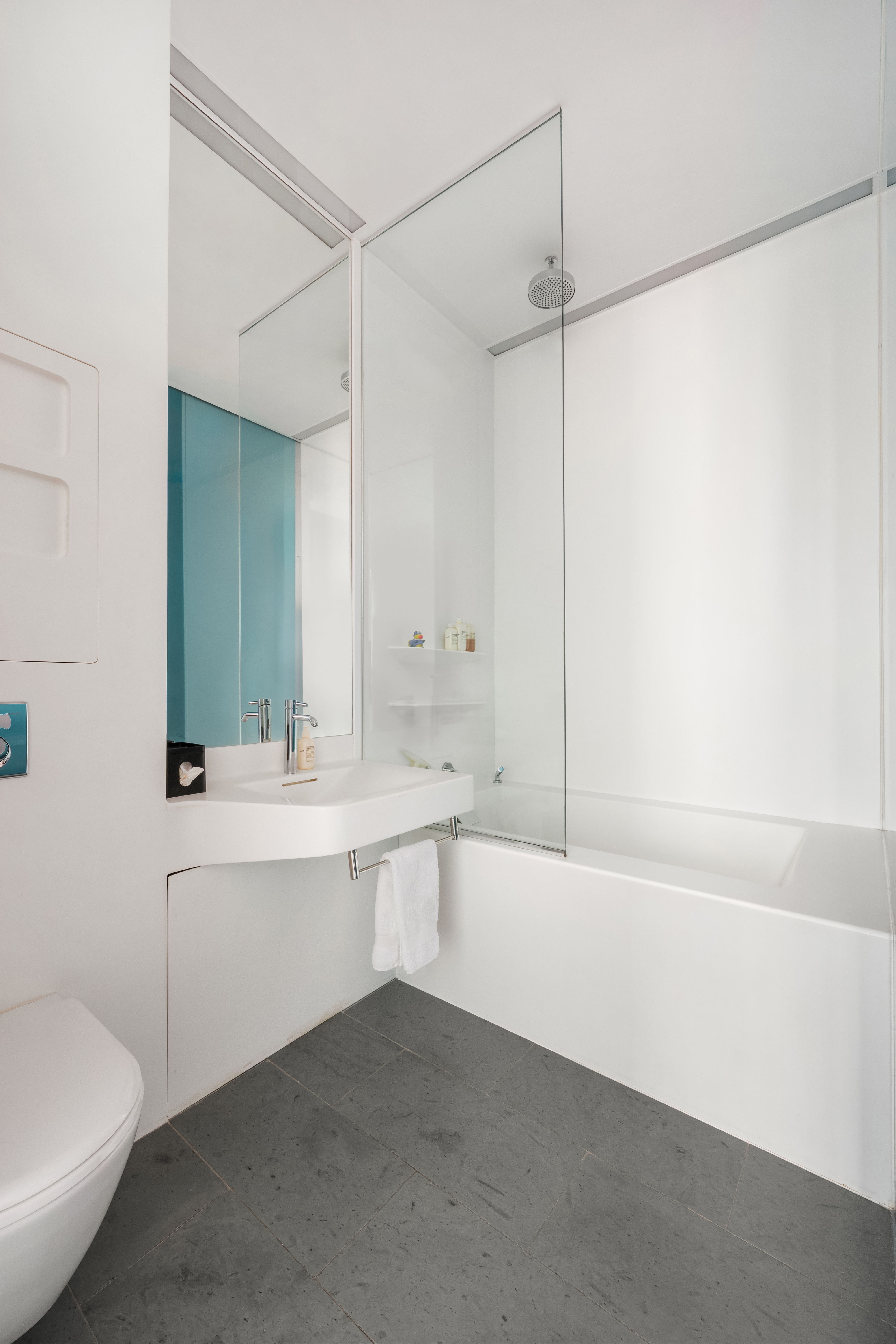 166 Perry Street, Unit 6A Manhattan, NY 10014 - Photo 12 of 20 a bathroom with a bathtub and a sink