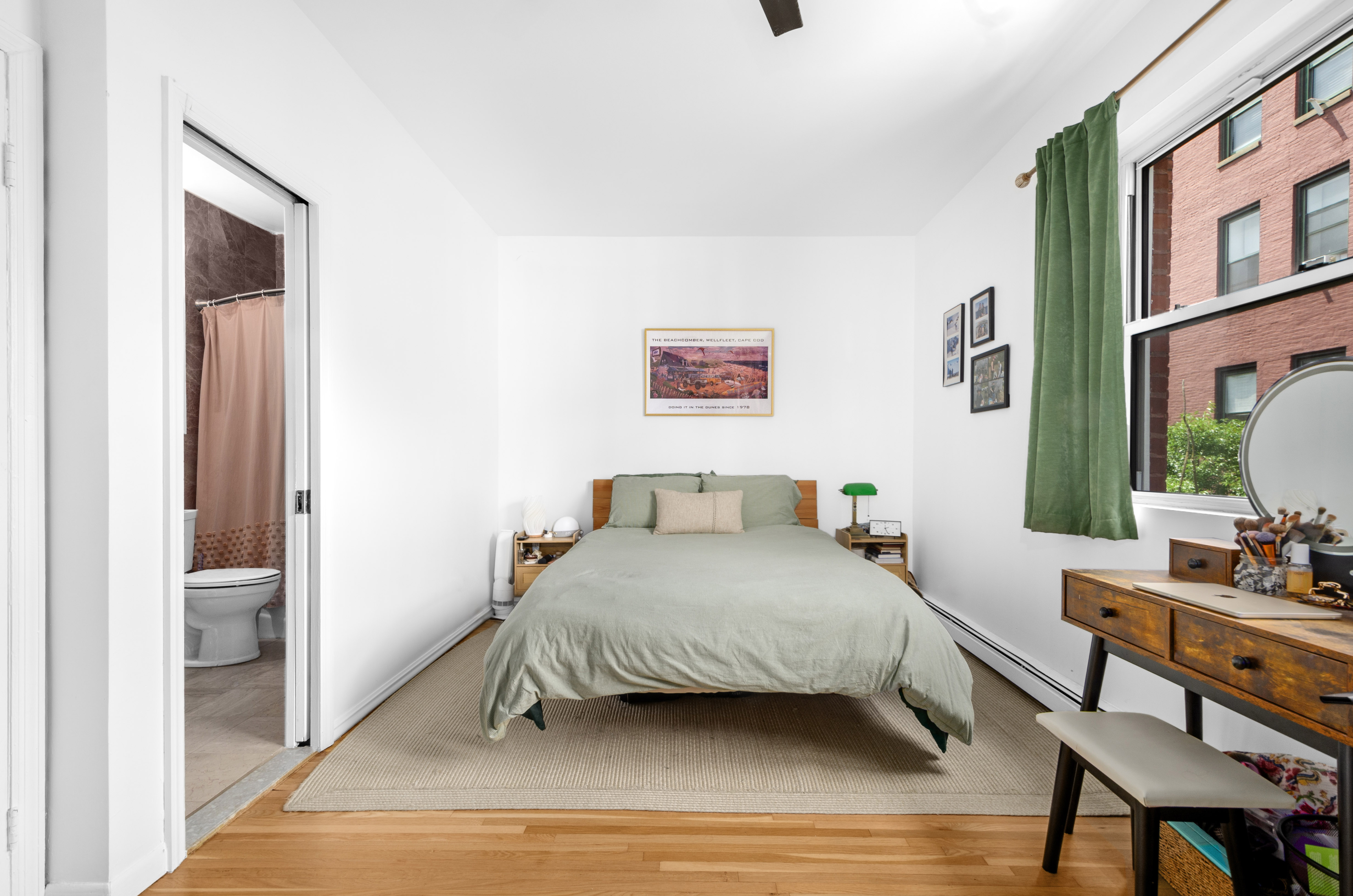 173 Greene Avenue, Unit 2 Brooklyn, NY 11238 - Photo 5 of 12 a bedroom with a bed and a table in it