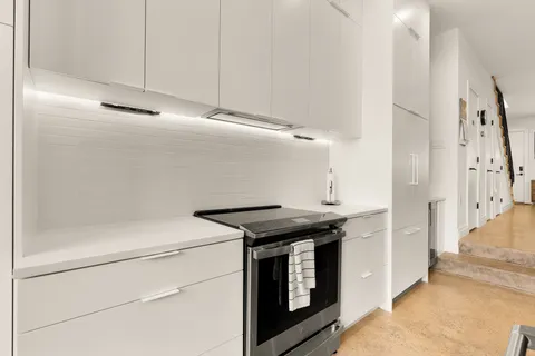 a utility room with washer and dryer