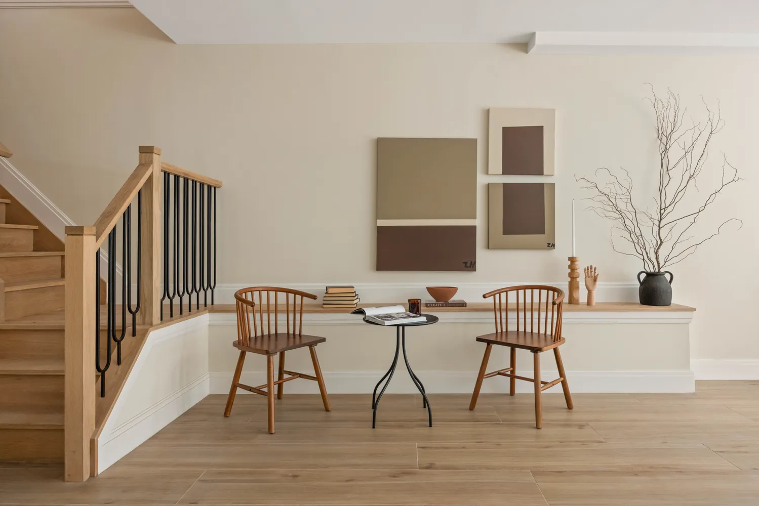 a view of a workspace with furniture and wooden floor
