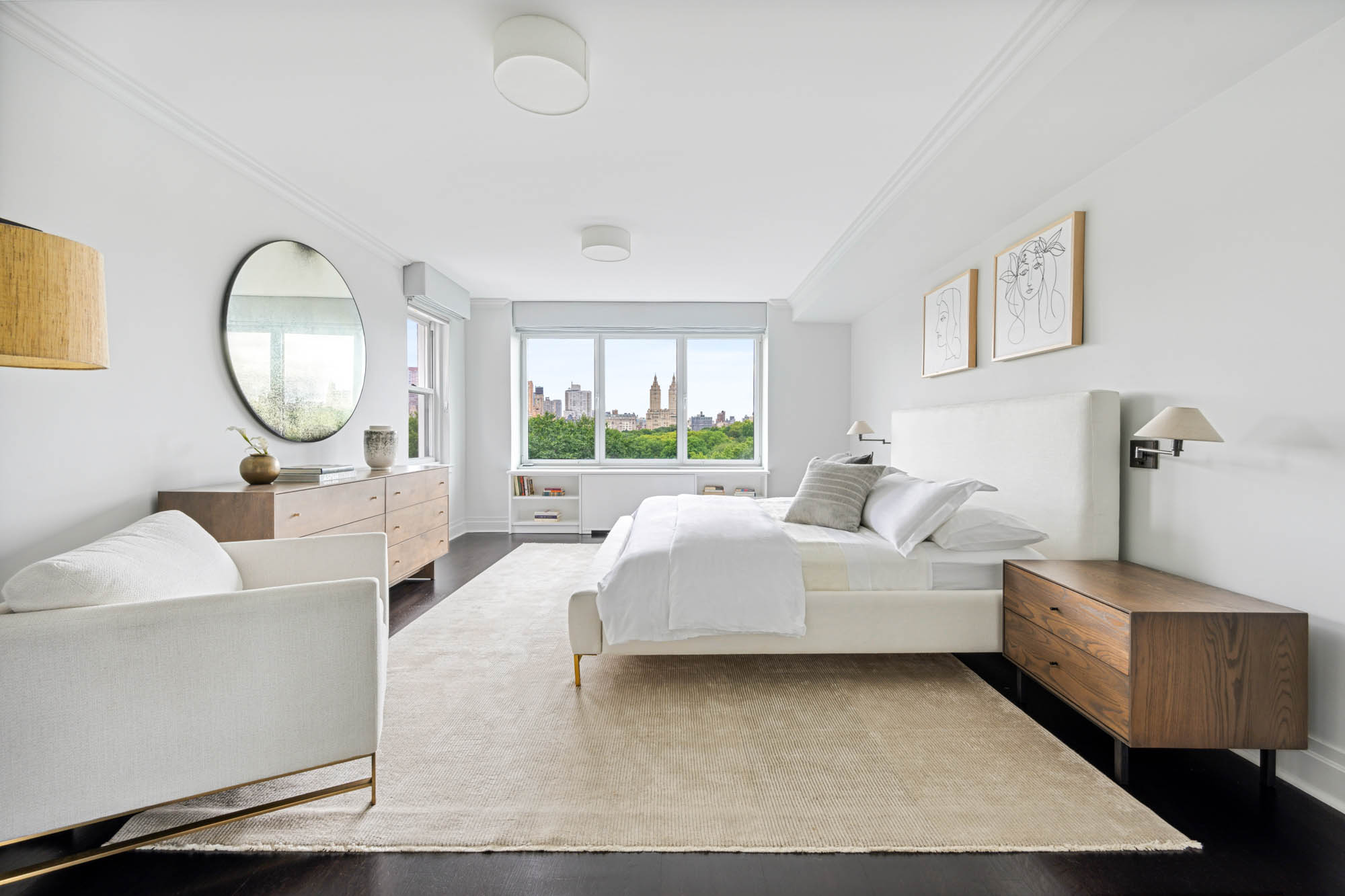 936 5th Avenue, Unit 10AB Manhattan, NY 10021 - Photo 26 of 37 a living room with furniture and a large window
