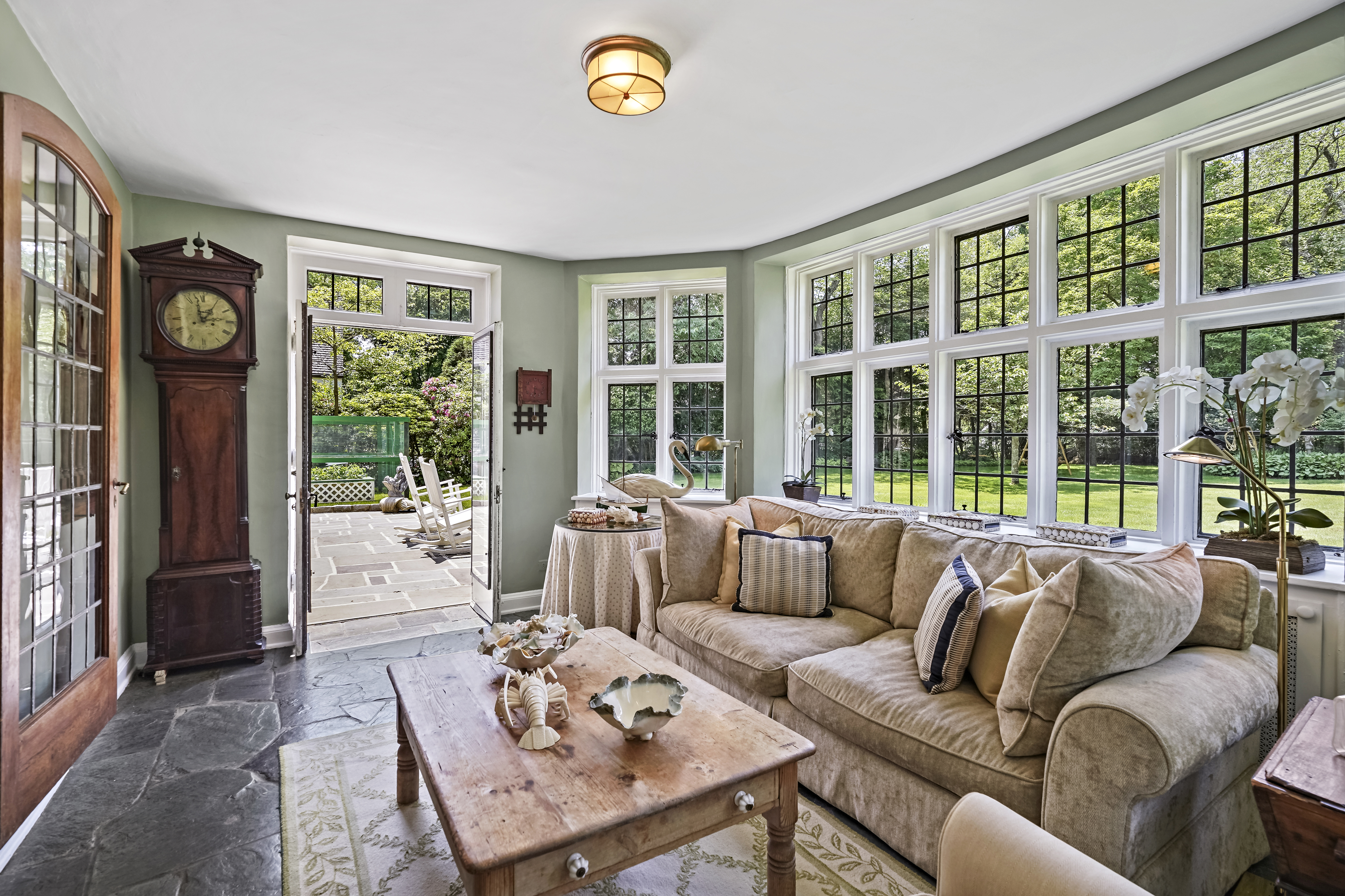 19 Avon Road Larchmont, NY 10538 - Photo 9 of 35 a living room with furniture and a large window