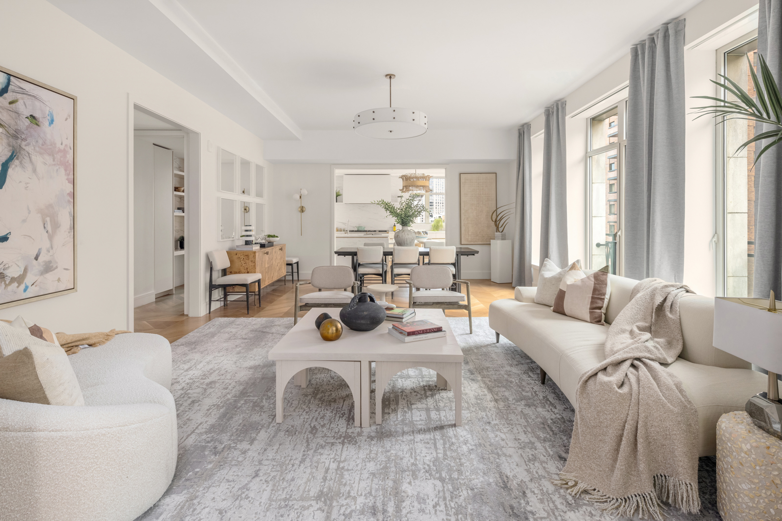 1228 Madison Avenue, Unit 10 Manhattan, NY 10128 - Photo 6 of 21 a living room with furniture and a large window