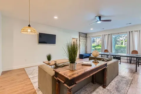 a view of a workspace with furniture