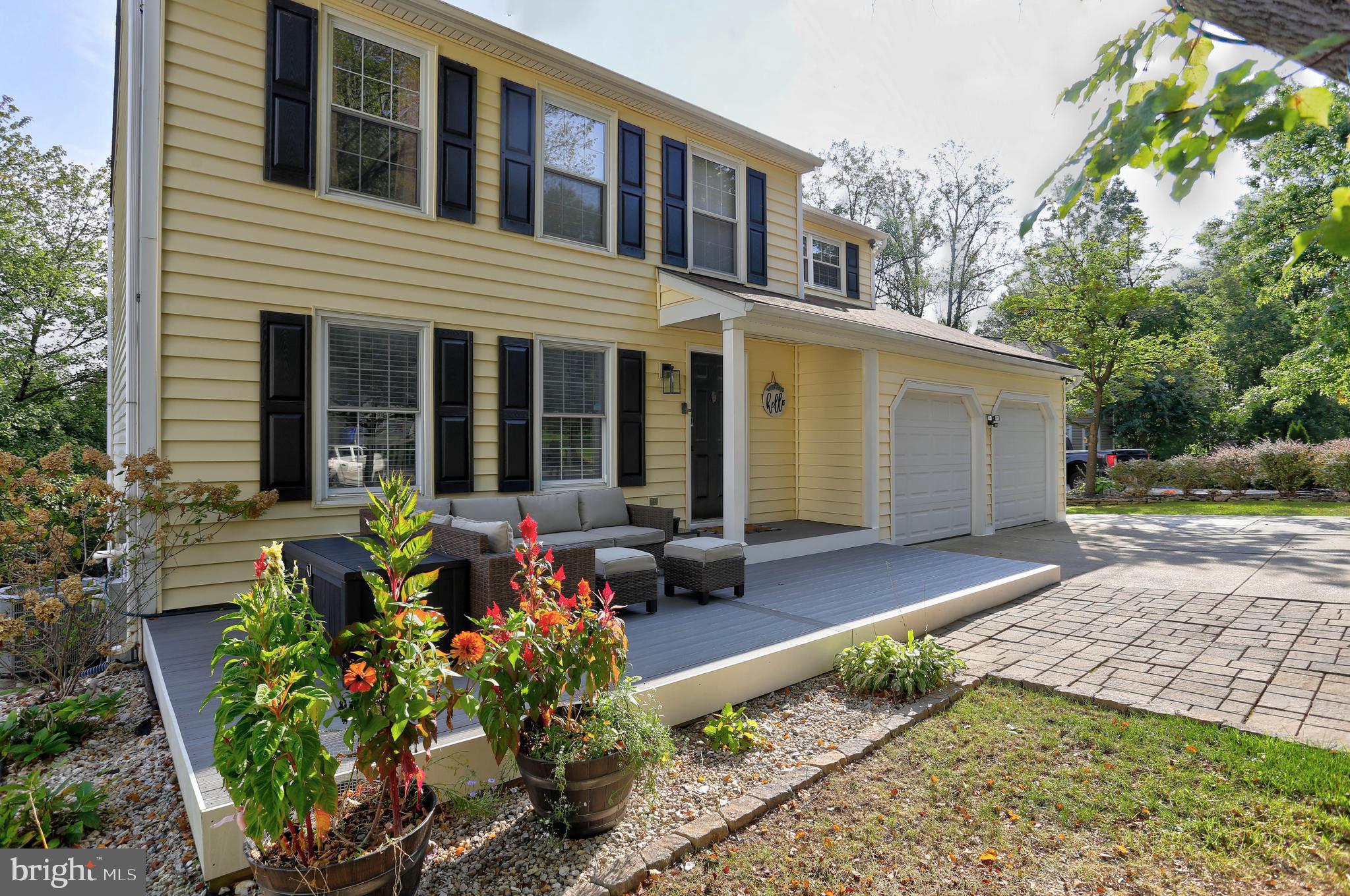 6257 Fairbourne Court Hanover, MD 21076 - Photo 3 of 47 a view of a house with sitting area and garden