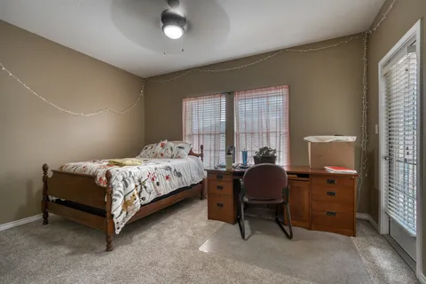 a bedroom with a bed and a closet