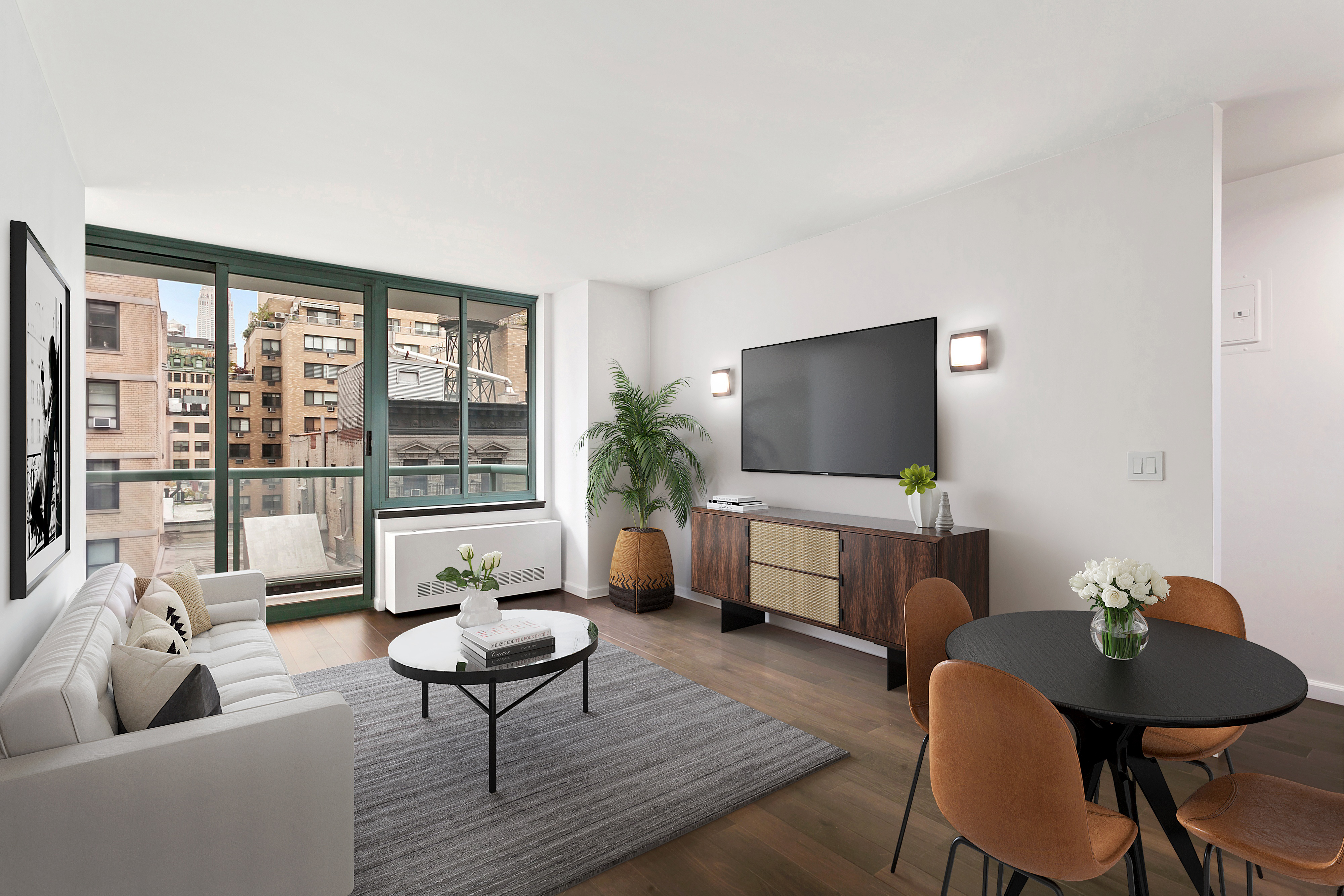 a living room with furniture a flat screen tv and a large window