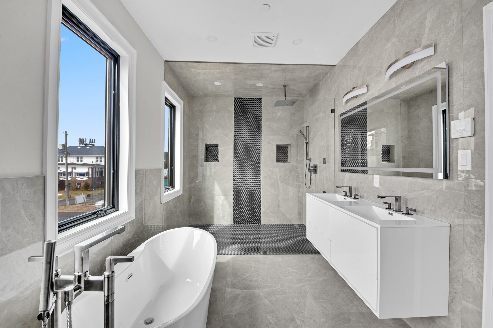 5 Osprey Court Staten Island, NY 10308 - Photo 24 of 50 a spacious bathroom with a double vanity sink a mirror and a bathtub