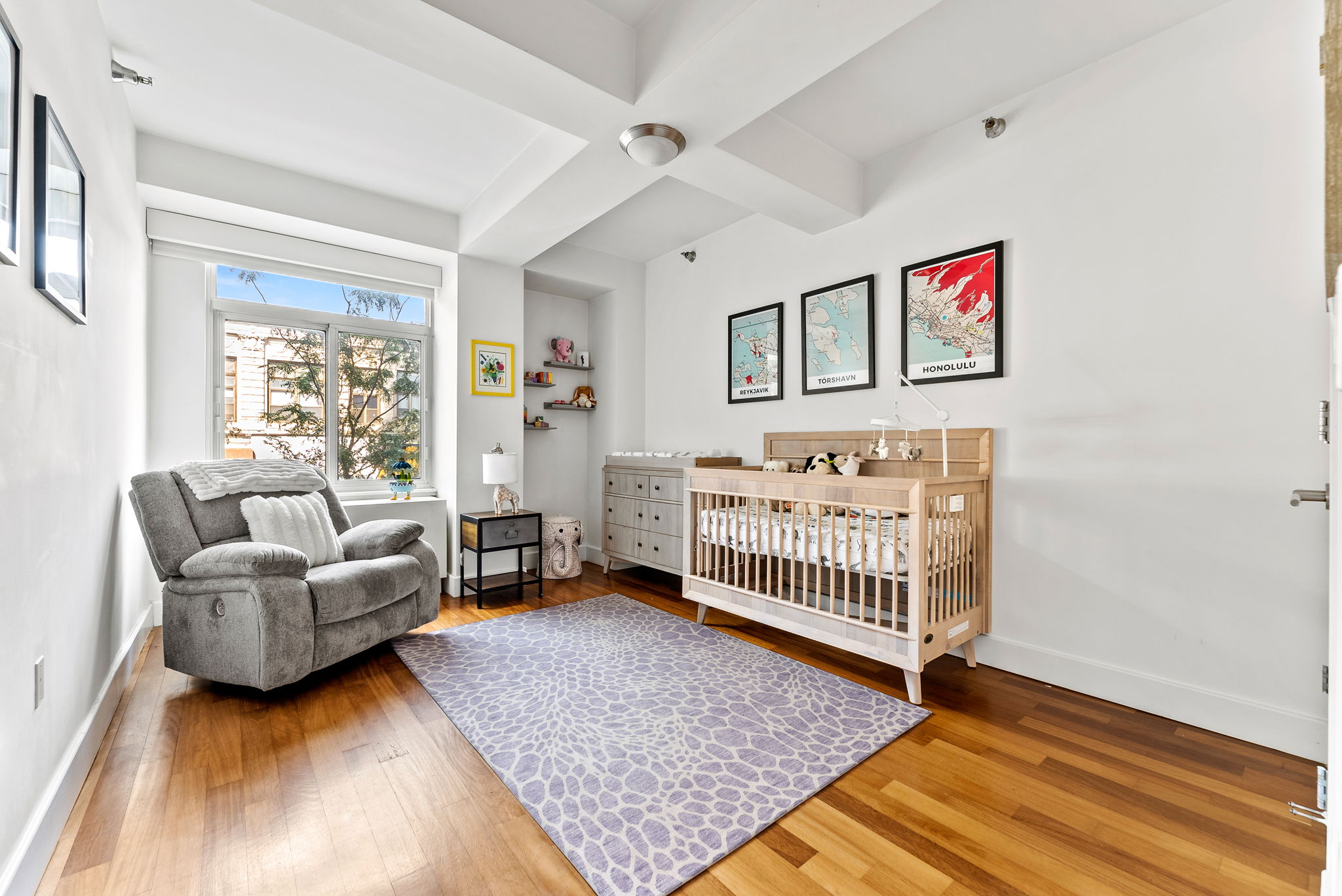 106 West 116th Street, Unit 2A Manhattan, NY 10026 - Photo 10 of 16 a bedroom with a bed and a couch